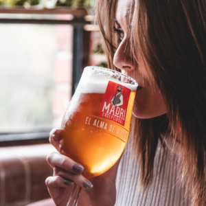 Image of woman drinking Madri