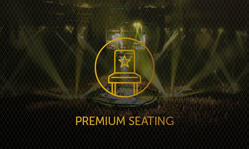 View of the OVO Hydro stage and crowd with Premium Seating text and icon overlay.