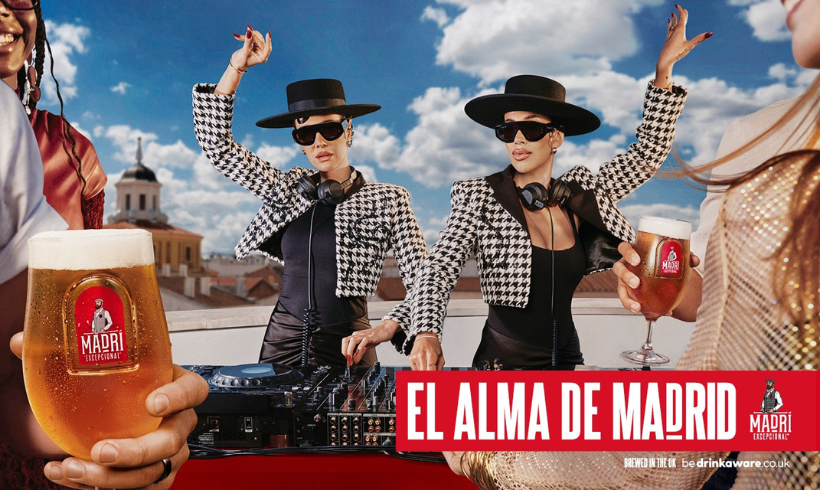 Madri promotional image with two woman dj-ing and other around with glasses of Madri in their hands with Madri's slogan "El alma de Madri"
